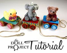 three small wooden toy animals on a train