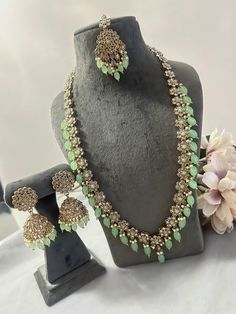 Plz let us know within 24hrs of receiving item if there is any issue with it and post within 7days of delivery. This listing comprises of a Beautiful Rani Haar Jewellery Set! Necklace Drop -13 inches approx. jhumka drop -6.5 cm approx. The pic shown is of the real product and you will receive exactly what Is shown in the pic. So plz buy with confidence 😊 Many thanks for visiting my shop snd hope you could find the perfect set to suit the occasion x Any Questions? Plz Ask? Green Jewelry Sets With Latkans For Diwali, Heavy Green Necklace For Eid, Green Bollywood Jewelry Sets With Latkans, Heavy Green Kundan Necklace For Eid, Green Kundan Necklace With Matching Earrings For Festivals, Elegant Long Green Kundan Necklace, Green Hand-strung Long Necklace, Bollywood Style Green Gold-plated Necklace, Rani Haar