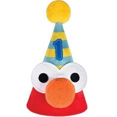 a red and yellow birthday hat with a number one on it's face, sitting in front of a white background