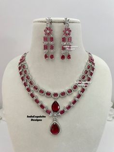 Double layer American Diamond Necklace Set / CZ Necklace/Indian Jewelry/ Reception Jewelry/ Bollywood Jewelry/ 2 two tier necklace/silver red All items are shipped from Brampton, Ontario, Canada. If you need your item by a certain day, please reach out to us for express delivery option before placing the order so that we can update the shipping for you. Standard shipping/delivery timeline Below are the delivery timeline estimates once the order is shipped. ---> USA delivery timeline * 3-6 busine Red Sterling Silver Jewelry Sets For Party, Red Sterling Silver Party Jewelry Sets, Silver Layered Jewelry For Party, Layered Silver Necklaces For Parties, Layered Silver Jewelry For Parties, Red Double Strand Jewelry For Party, Double Strand Red Jewelry For Party, Red Double Strand Party Jewelry, Red Double Strand Necklace For Party