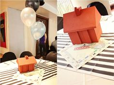 there are balloons and paper houses on the table