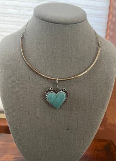 Beautiful blue Kingman turquoise heart shaped stone. This stone like the majority of turquoise I use in my pieces was purchased from the Kingman Turquoise Store in Arizona. The Kingman Turquoise Mine is the last full-time production mine in the US. Hung from handmade necklace, long checker length, about 16/17 inches. Handmade Heart-shaped Turquoise Necklace, Elegant Heart-shaped Turquoise Necklace, Turquoise Heart-shaped Necklaces For Gifts, Unique Turquoise Heart-shaped Jewelry, Bohemian Heart-shaped Turquoise Necklace, Turquoise Heart, Kingman Turquoise, Turquoise Pendant, Handmade Necklaces