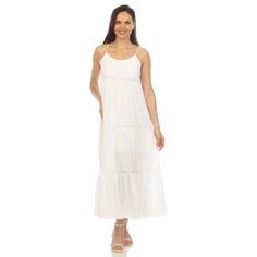 Our Tiered Ruffle Maxi Dress is designed to make you feel and look your best. The scoop neck adds a touch of sophistication, and the adjustable spaghetti straps ensure a personalized and comfortable fit. Features an exquisite lace detail, the tiered ruffle design adds depth and movement to the dress. Pair it with sandals and a sun hat for a chic daytime look or elevate it with heels and jewelry for an evening ensemble. -Care Instructions: Machine Wash Cold -Material: 95% Polyester/ 5% Spandex Product Specifications: -Adjustable Strap -Lace Detail -Tiered Ruffle Elegant White Dress, Dynamic Movement, Ruffle Maxi Dress, Ruffle Design, Dress Crafts, Tiered Maxi Dress, Ruffled Maxi Dress, White Mark, White Midi Dress