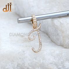 Solid 14k Yellow Gold Pave Diamond Initial J Alphabet Charm Pendant Jewelry Wholesale PEMJ-1720 14k Gold J Pendant. Pave Diamond Pendant. Pendant Chain Necklace. Alphabet Charm Pendant. J Letter Pendant. Diamond Charm Pendant. 22x12 MM Pendant Size. Here Are Some Amazing Ways To Take Care Of Your Precious Diamond Jewelry. Always. * Apply lotion, cosmetics, hairspray, and perfume before dressing in jewelry. * When undressing, wipe each piece with a clean soft cloth to remove oils and perspiration Diamond Cut Initial Pendant Jewelry, Luxury Single Cut Diamond Initial Pendant Jewelry, J Letter Pendant, J Locket Letter J, J Alphabet, J Initial, Initial J, Jewelry Letter, Diamond Pendant Jewelry