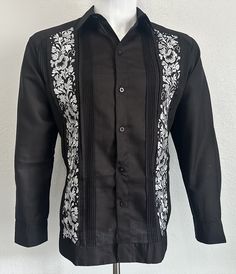 Mexican Guayabera.  Beautiful and Elegant.  Handcrafted in Merida, Yucatan Mexico. Made out of Milano Flame = Cotton & Polyester  Black Color Linen Fabric Silver Flower Embroidery  Hummingbird Flower Design  Two Embroidery Panels Long Sleeve.  Beautiful Elegant Guayabera Shirt.  Good for Casual Wear, Wedding, Fiesta, Tropical, Birthday or any other occasion. 100% New Product - New Inventory 2024 We gladly accept returns and exchanges with these terms and conditions.  We do charge a 25% Fee on an Guayabera Wedding, Wedding Fiesta, Shirt Elegant, Wedding Shirt, Mexican Shirts, Fiesta Tropical, Guayabera Shirt, Guess Shirt, Silver Embroidery