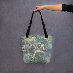 Step into a world of tranquility with our Serenity Tote Bag, where every glance transports you to a realm of soothing blues, greens, and whites, merging in a mesmerizing fluid art design. Crafted for those who seek solace in the everyday, this spacious and stylish tote bag is not just a carrier for your essentials, but a reflection of your inner calm. Individually made with care when you place your order, each Serenity Tote Bag is a testament to artisanal craftsmanship. So, whether you're treating yourself or surprising a lucky friend with a thoughtful gift, allow us a moment to handcraft this piece of tranquility just for you. Here's why you'll love it:- **Premium Quality**: Constructed from 100% spun polyester fabric, our tote bag is durable yet lightweight, ensuring it withstands your d Artistic Green Tote Shoulder Bag, Artistic Green Tote Bag, Artistic Green Rectangular Shoulder Bag, Artistic Blue Bags For Everyday, Artistic Green Shoulder Bag As Gift, Artistic Blue Bag As A Gift, Artistic Blue Bag As Gift, Artistic Blue Bags As Gift, Stylish Tote Bag