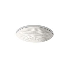 a white ceiling light on a white wall