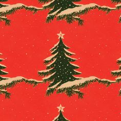 a red and black christmas tree wallpaper with snow falling on the trees in the background