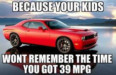 a red car with the words, because your kids won't remember the time you got 39 mpg