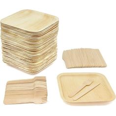 a stack of wooden plates and forks on a white background