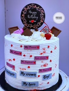 a birthday cake decorated with chocolate and candy