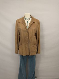 "Classic vintage lightly sueded leather jacket, comfortable casual style natural tan color. Quality construction and nice detail. Unique piece for casual wear or street wear. Front pockets. Fully lined inside. Condition is good, small spots no major stains, no rips or damage, lots of life left. Some minor shredding and spots on lining. Soft lightweight leather with light natural wear. No size marked - please go by measurements. Shown on a 6 mannequin. Label is Leathers by New England Sports wear Casual Brown Suede Leather Jacket, Casual Leather Blazer With Pockets, Casual Brown Leather Blazer, Casual Suede Leather Jacket With Pockets, Casual Brown Suede Outerwear, Casual Suede Single Breasted Outerwear, Casual Single Breasted Suede Outerwear, Brown Suede Leather Jacket For Spring, Brown Suede Outerwear For Spring