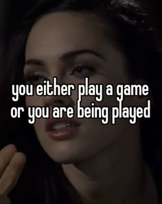 a woman with the words you either play a game or you are being played