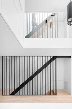 the stairs in this modern house are black and white