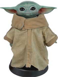 the child yoda doll is on display