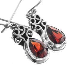 13/16" Teardrop Red Garnet 925 Sterling Silver EarringsHandcrafted earrings in  925 sterling silver. You can see the workmanship in the finesse of the settings, the bright shine and even polish of the silver. You will be thrilled with the quality of our crafting and materials. A trusted designer and retailer of high-end silver since 2003.Hook Type:  French wiresSilver Type:  925 Sterling SilverEarring Size:  20x9mm(13/16x3/8") excl. wiresEarring Weight:  ~2grams/eaEarring Material:  Red garnet(9 Red Polished Earrings For Gift, Classic Red Sterling Silver Earrings, Classic Sterling Silver Teardrop Earrings For Anniversary, Red Pear-shaped Sterling Silver Jewelry, French Wire, Handcrafted Earrings, Wire Earrings, Red Garnet, 925 Sterling Silver Earrings