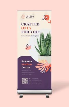 a roll up banner with a succulent plant on it