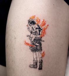 a person with a tattoo on their thigh holding a fire extinguishers arm