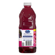 a bottle of red juice on a white background