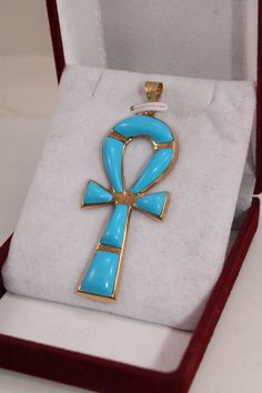 "Egyptian Handmade Ankh Cross Key of Life Turquoise 18K Yellow Gold Pendant 6.5 Gr Weight Approximate : 6.5 Gr Height : 2.2\" = 56 mm Width : 0.9\" = 23 mm ✔ IT IS Tested & SIGNED WITH THE EGYPTIAN Gold Government HALLMARK FOR 18K GOLD to Ensure Authenticity. ✔ Lovely gift idea ABSOLUTELY GORGEOUS, LOOKS FABULOUS ON. ✔ 100% Egyptian handmade. ✔ Condition: A brand-new, exactly as on the photos. ★ GIFTS ✔ All items are packaged in a paper jewelry gift box, ready for gifting. ✔ If you are sendi Key Of Life Egyptian, Horus Eye, Egyptian Gold, Egyptian Revival Jewelry, Egyptian Painting, Egypt Jewelry, Key Of Life, Ankh Cross, Maximalism