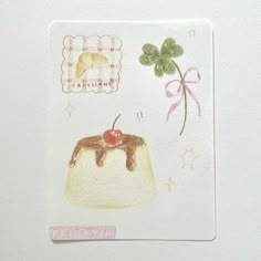 a piece of paper with an image of a cake and shamrocks on it,