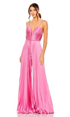 Long pleated jumpsuit with v-neckline. Pastel Prom Dress, Quinceanera Dresses Red, Purple Quinceanera Dresses, Sleek Jumpsuit, Quinceanera Dresses Pink, Designer Formal Dresses, Red Quinceanera Dresses, Pleated Jumpsuit, Formal Jumpsuit