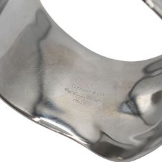 Tiffany & Co. x Elsa Peretti 'Medium Bone Cuff' bracelet in gunmetal tone 925 sterling sivler with an organic asymmetrical design. Brand = Tiffany & Co. Size = Medium Condition = 7.5/10, Very good. Light scratching throughout, faint tarnishing. Material = Sterling silver Dimensions = 61mm SKU = 4450-103 Sterling Silver Tiffany, Sterling Silver Cuff Bracelet Tiffany & Co., Elsa Peretti Tiffany, Bone Cuff, Elsa Peretti, Tiffany And Co, Asymmetrical Design, Scarf Jewelry, Sneaker Collection