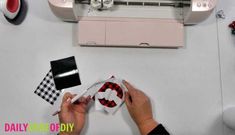 someone is working on an origami machine