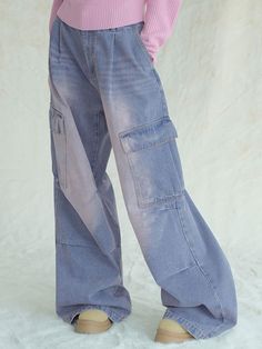 Featuring big size dimensional side pockets, these casual and stylish cargo pants have wide silhouette with front and knee tucks. They're made from high-density 7's cotton denim and are finished with high-quality sewing for durability.  - Zip and button fastening  - Two front slash pockets- Two side cargo pockets- One back flap pocket- Front tucks- Double knee tucks with rivets- Logo-engraved button and rivets- Logo leather label at back- Wide fit - Unisex wear Baggy Cotton Cargo Jeans With Pockets, Denim Blue Wide-leg Jeans With Pockets, Baggy Washed Blue Pants With Pockets, Baggy Wide-leg Jeans With Pockets, Cotton Cargo Jeans With Multiple Pockets In Washed Blue, Oversized Wide Leg Jeans With Pockets, Baggy Washed Blue Cargo Pants With Pockets, Straight Leg Washed Blue Cargo Pants With Pockets, Urban Oversized Cargo Pants With Pockets