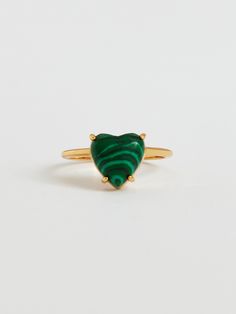 Editor's NotesThis charming viollina jewelry is ideal for adding a little luxury to add to any look.- Dome shaped heart prong setting point- Malachite gemstone used- Lovely and kitsch mood- Daily point itemMeasurements(in.)S / M / L- Small: 10- Medium: 13- Large: 16- Heart: 0.39 in.Composition & Care-  22K Gold Plating  Brass  Malachite- Avoid moisture and store in a zipper bagDesigner- by VIOLLINA Fine Jewelry Green Heart Shaped Ring, Green Heart-shaped Fine Jewelry Ring, Elegant Emerald Heart-shaped Ring, Green Heart Ring For Gift In Fine Jewelry Style, Green Heart-shaped May Birthstone Ring, Emerald Heart Charm Jewelry, Green Heart-shaped Ring As A Gift, Green Heart-shaped Ring For Gift, Heart-shaped Emerald Jewelry For Valentine's Day