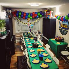 a table set up for a birthday party