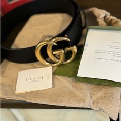 Authentic Gucci Belt Used One Time. Received As A Gift. Do Not Use It. Comes With Dust Bag And Paperwork. Style 400593 Ap00t 1000 Emblematic Looks Are Presented In The Ouverture Collection And Create A Link To Gucci’s Rich History. A Wide Leather Belt With The Double G Buckle, An Archival Reprisal From The '70s Collections. The Women's Leather Belt Can Be Worn On The Hips Or At The Waist To Create Different Looks. Black Smooth Leather Antiqued Brass Hardware With A Shiny Finish Double G Buckle Buckle: 3"W X 2.4"H 1.5" Belt Width Made In Italy Can Be Worn As A Hip Or Waist Belt. Womens Leather Belt, Wide Leather Belt, Antique Brass Hardware, Looks Black, Gucci Accessories, Gucci Belt, Brass Hardware, Waist Belt, Black And Gold