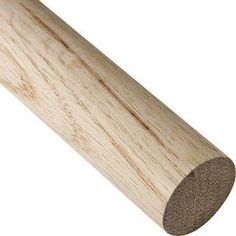 a close up of a wooden stick on a white background