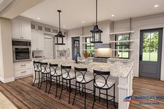 an open concept kitchen and dining room with wood flooring, white cabinets and marble countertops