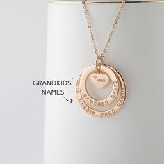 These two rings are stamped with her loved one and a small heart charm at the center to share their love with family members. The heart charm can be engraved with however you call your grandma: nana, mimi, abuela, omi, gigi - just whichever dear to you! A perfect gift for Grandma on any occasion. ► GRANDMA NECKLACE WITH KIDS NAMES * WORD LIMIT: Small ring: 4-5 words / Big ring: 6 words. Date is counted as 2 words. *  Small ring measures approx. 3/4" (20mm). Big ring measures approx. 1" (26mm). H Nana Christmas, Grandma Jewelry, Nana Necklace, Grammy Gift, Grandmother Necklace, Grandmother Jewelry, Grandma Necklace, Big Ring, Small Ring