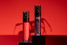 Blood red or pure black night ❤️‍🔥🖤 Get intense shine in Liquid Catsuit High-Shine Lip Colors⁠ 🩸 Bloodstained⁠ 🌃 Midnight Sky⁠ Now @Walmart @Amazon @cvspharmacy, at wetnwildbeauty.com and coming soon to @ultabeauty (10/9) 👻 #CrueltyFree #WNWSpookySeason⁠ Black Night, Midnight Sky, Blackest Night, Pure Black, Blood Red, Catsuit