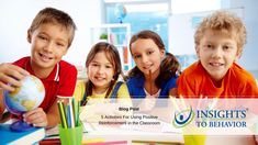 three children sitting at a table with pens and pencils in front of the caption