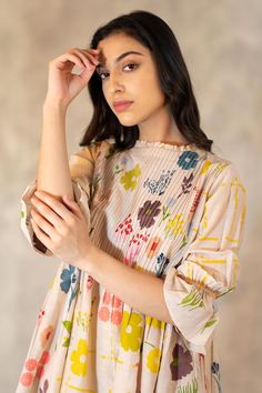 Buy Arcvsh by Pallavi Singh Beige Cotton Silk Floral Print Tunic Online | Aza Fashions Multicolor Blouse With Gathered Sleeves, Floral Print Blouse For Spring Gatherings, Spring Floral Print Blouse For Gatherings, Multicolor Printed Blouse For Spring, Spring Tunic Blouse With Printed Motifs, Spring Beige Dress With Printed Motifs, Beige Spring Dress With Printed Motifs, Spring Beige Dresses With Printed Motifs, Beige Dresses With Printed Motifs For Spring