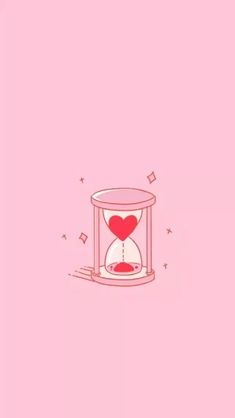 an hourglass with a heart in it on a pink background