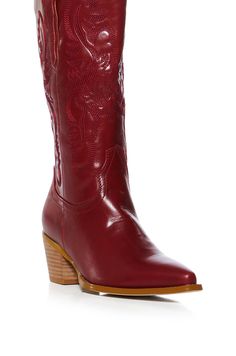 Meet your new go-to bootie! The AZALEA WANG Flint Red Cowboy Bootie is a fabulous faux leather style featuring a rounded mid-calf shaft, a pointed toe silhouette, a chunky stacked heel, side pull tabs, and a pull-on fit. Complete with tonal embroidered detailing. Pairs perfectly with denim and faux leather pieces. (all measurements approximate from a size 7.5) - Faux Leather Upper - Pointed Toe - Chunky Heel - 12” Shaft Height - 2.75��” Heel Height - 12.75” Calf Circumference - 14.5” Shaft Opening Circumference - Imported Product ID: 384548 Azalea Wang, Leather Pieces, Leather Style, Stacked Heel, Chunky Heels, Leather Fashion, Mid Calf, Bootie, Heel Height