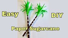 two palm trees made out of paper with the words easy diy