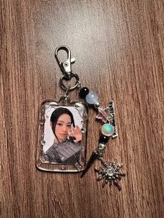 a keychain with an image of a woman on it