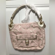 Nwt Coach Penelope Pearl Signature Buckle Hobo Bag. F18875. Bag Still Has Paper On Hardware And Handle From Shipping. Gold Hardware, Interior Has One Zip Pocket And Two Slip Pockets Outside Has Snap Pocket On Front And Zippered Pocket On Back Pink Pouch Hobo Bag For Travel, Pink Top Handle Hobo Bag For Travel, Pink Hobo Bag For Travel, Elegant Pink Crossbody Hobo Bag, Pink Coach Pouch Bag, Pink Hobo Bag With Removable Pouch, Pink Pouch Shoulder Bag With Detachable Handle, Pink Shoulder Bag With Gold-tone Hardware For Daily Use, Chic Pink Pouch Hobo Bag