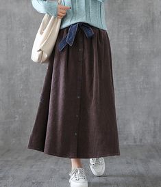 Casual Cotton loose fitting Women's Skirts Casual Brown Skirt For Winter, Casual Brown Winter Skirt, Brown Cotton Skirt For Winter, Relaxed Fit Brown Skirt, Casual Brown Solid Color Skirt, Non-stretch Brown Skirt With Pockets, Non-stretch Brown Cotton Skirt, Non-stretch Long Brown Skirt, Non-stretch Brown Long Skirt