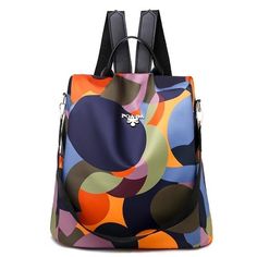 This Waterproof Qxford Shoulder Bag is a nice lightweight Anti-theft backpack. Can be used as a Small Travel Bag as well. Available in a wide range of pretty colors, the Colorful Geometric Backpack Purse is a Best Seller! The high density Oxford fabric and Polyester lining, is soft and has a shiny texture, scratch-resistant, and easy to take care for. The backpack comes with a detachable strap, that allows you the flexibility to wear it as a Shoulder bag/Tote bag/Purse/Shopping bags. Suitable fo Backpack Design, Women Backpack Fashion, Backpack Outfit, Women's Circle, Large Capacity Backpack, Anti Theft Backpack, Cute Backpacks, Girl Backpacks, Casual Backpack