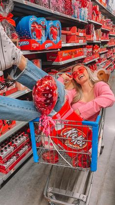 a woman sitting in a shopping cart at a store with her face painted like a pig