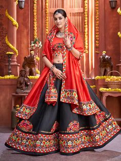 Black Art Silk Gamthi Work Designer Lehenga features a art silk blouse with art silk lehenga and dupatta. Embroidery have gamthi work with real mirror work and patch work. This Style is made in India and checked by hand to ensure high quality. Wash Care : Dry Clean Note: 1. Return Policy: As all the products in Myracou Traditional Chaniya Choli For Navratri, Evening Lehenga, Gamthi Chaniya Choli, Printed Chaniya Choli, Traditional Chaniya Choli, Silk Lengha, Flair Lehenga, Best Diwali Gift