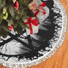 a christmas tree skirt with presents on it