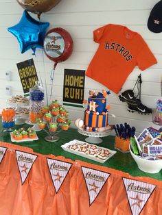 an orange and blue baseball themed birthday party