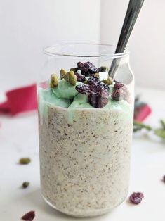 a glass jar filled with pudding and toppings